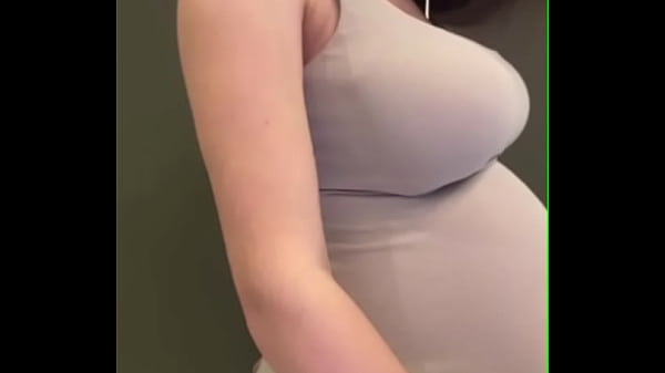 My pregnant stepmom shows her big milky tits