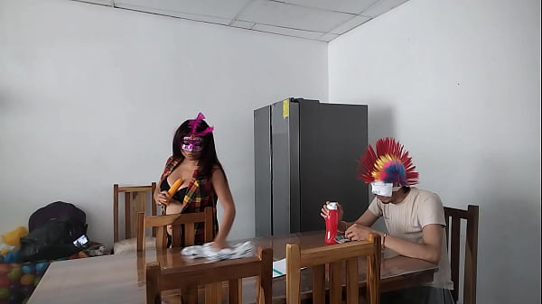 A housemaid touches her body very sensually and flirts with a dildo while feeding a blind man in the house.