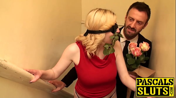 Busty sub has a rose in her mouth and a dick up her pussy